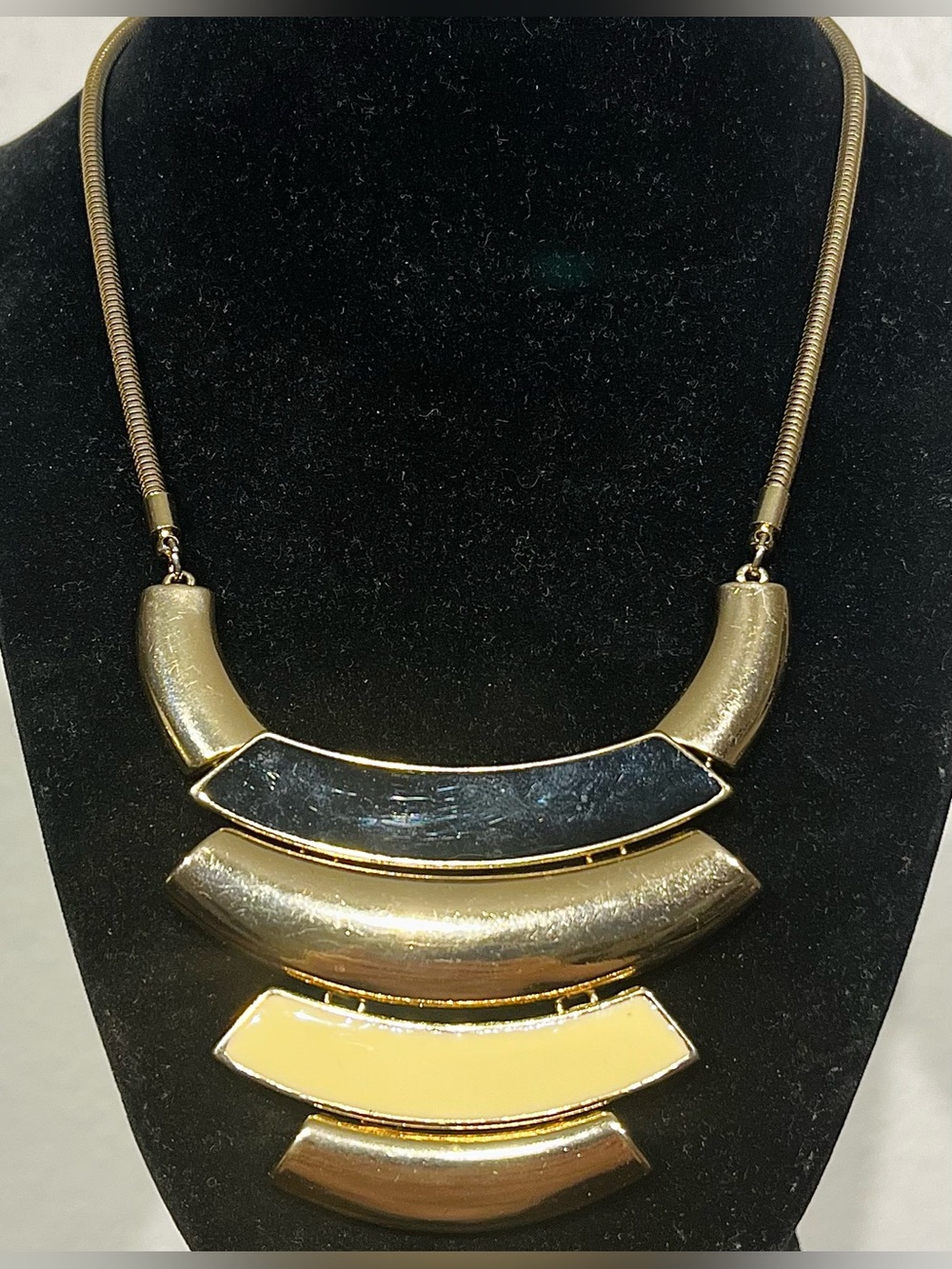 Ballet Gold Tone Statement Necklace with Black and Cream Enamel Accents